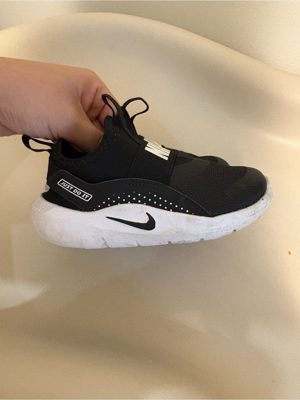 Nike Kids Black and White Slip-On Sneakers